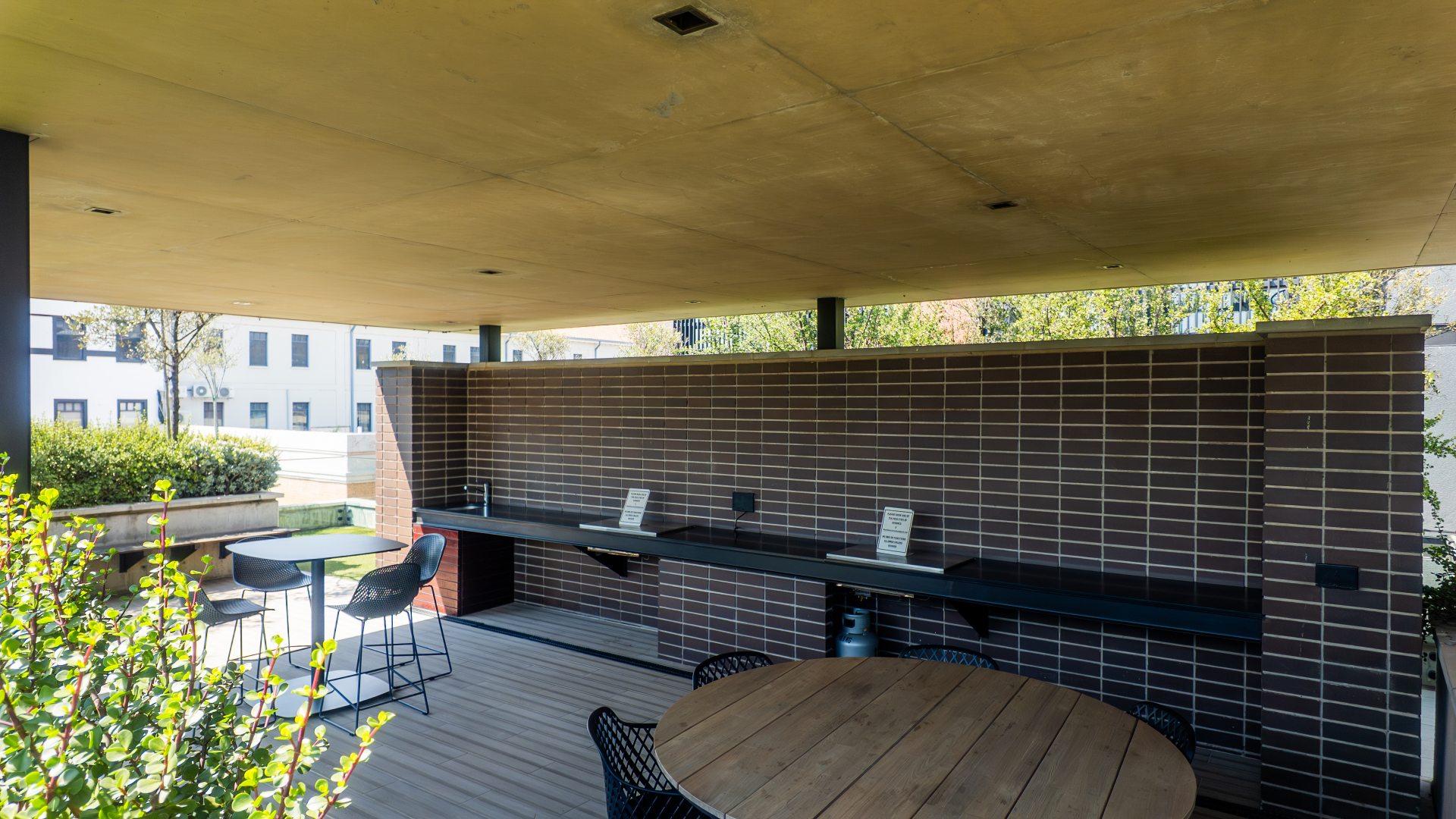 Covered rooftop braai counter and dining area